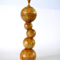 Lidded Box atop 4 multi axis turned  spheres (total 5 axis) : Ken Newton